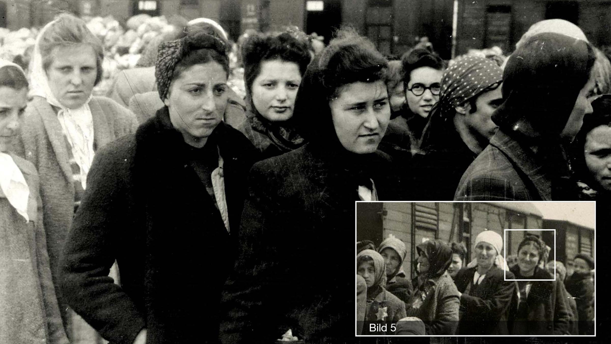 KZ Auschwitz-Birkenau - Hier die Frau mit Pelzkragen, die zuvor auf der Rampe zu sehen war.