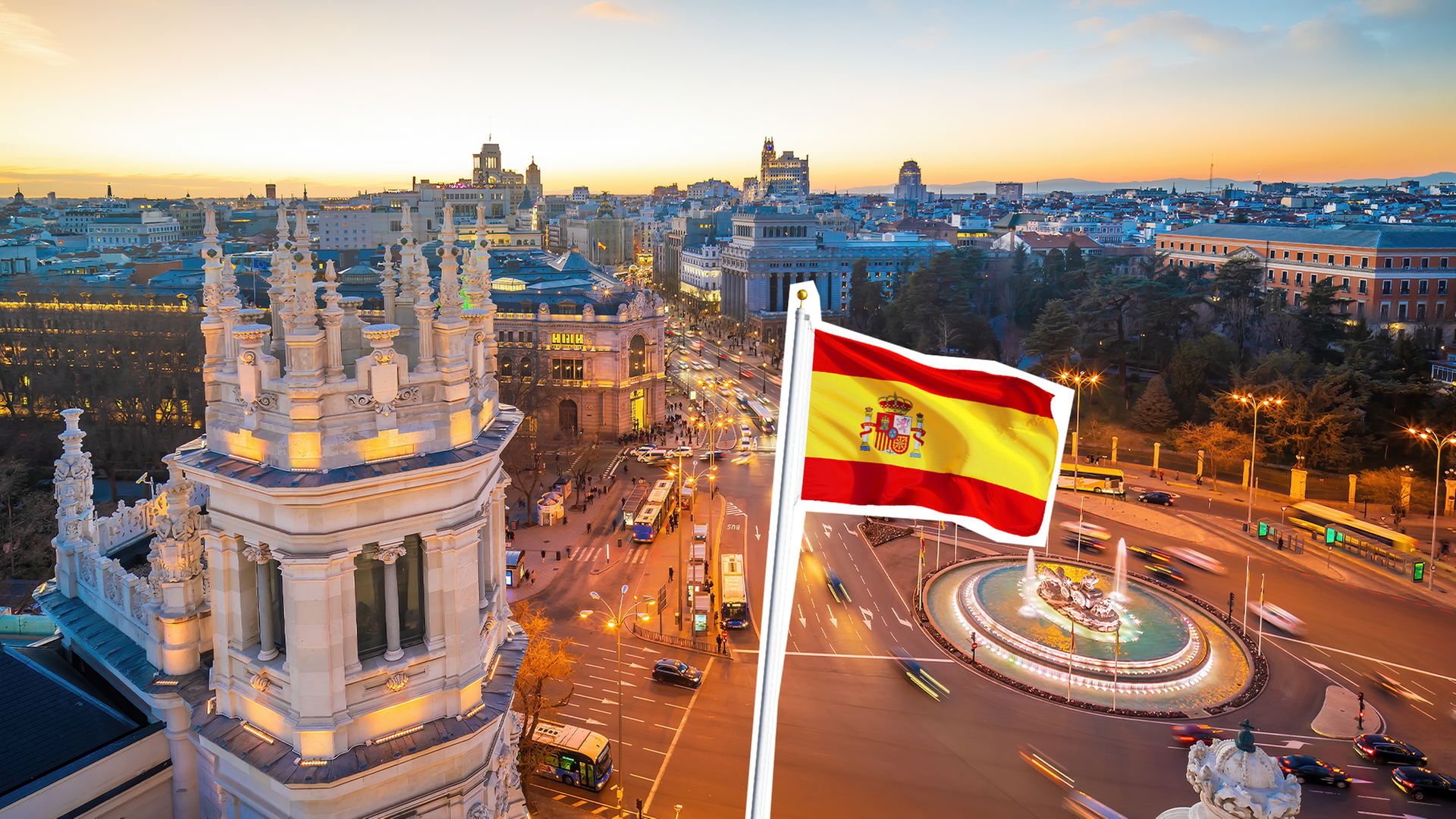 Spaniens Flagge vor einer Stadtansicht
