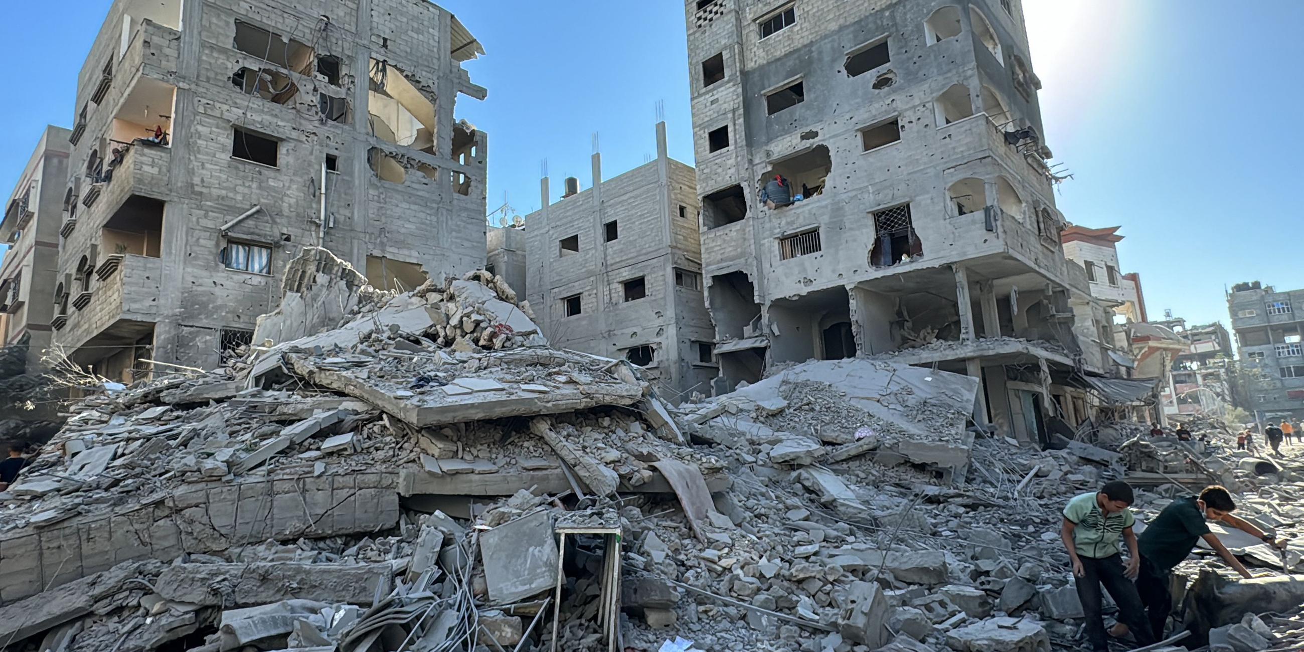 Palestinians inspect the damage after an Israeli airstrike in Beit Lahia, in the northern Gaza Strip on October 19, 2024, amid the ongoing conflict between Israel and the Palestinian Hamas militant group.