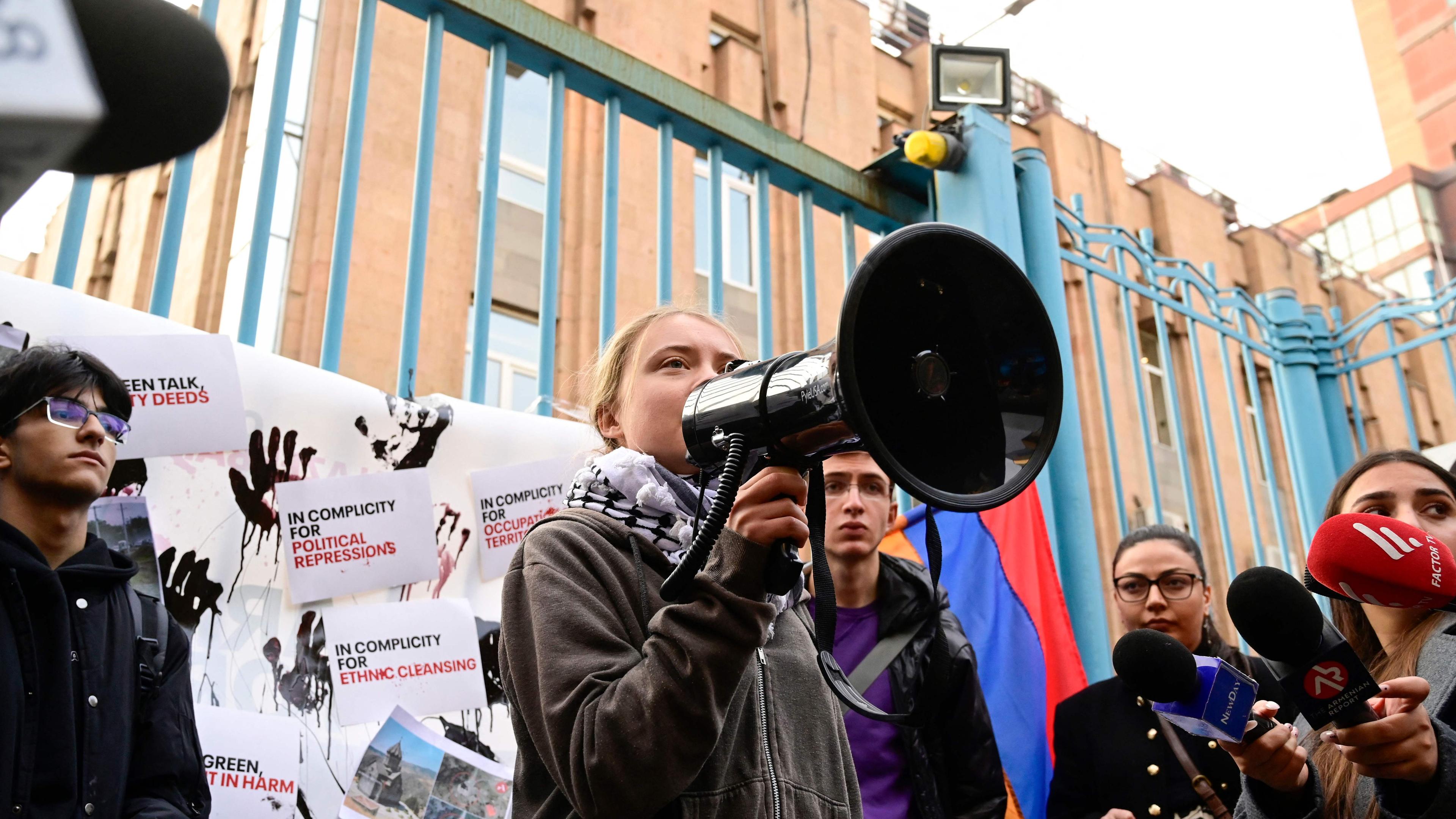 Swedish climate activist Greta Thunberg stages a United Nations Climate Change Conference (COP29) protest outside a UN representative office in Yerevan on November 15, 2024. The UN Climate Change Conference (COP29) is taking place in the Azeri capital of Baku from November 11 to 22, 2024.