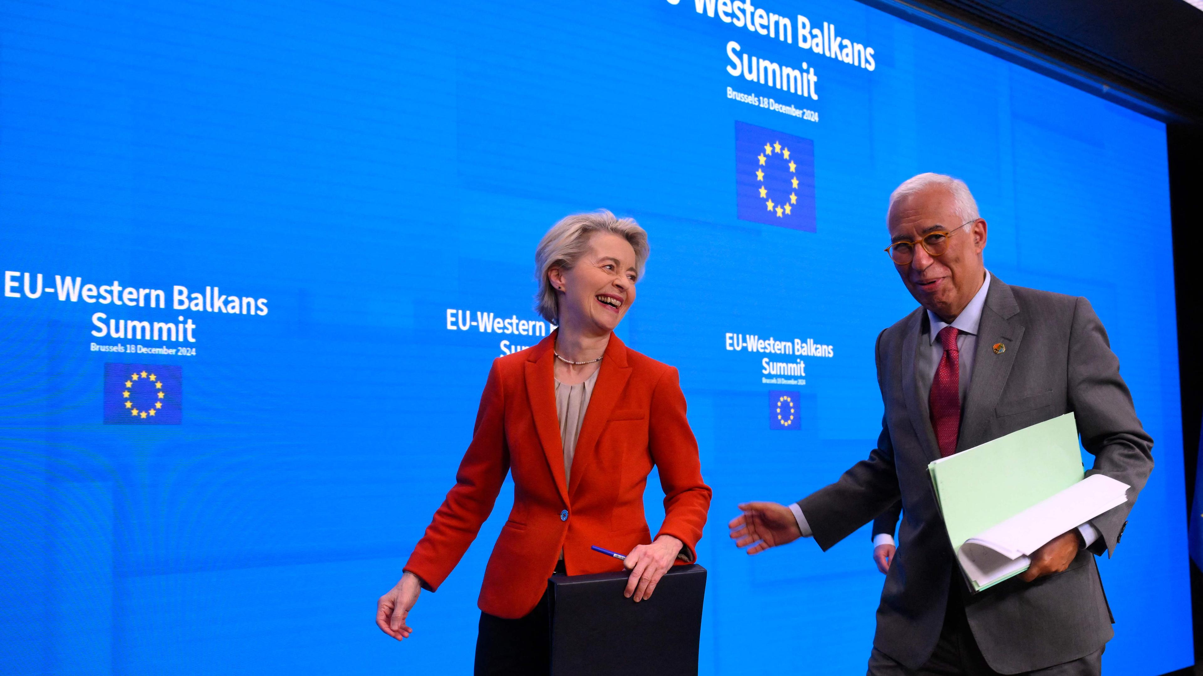 The President of the European Commission Ursula von der Leyen (L) and European Council President Antonio Costa leave after a press conference during the EU-Western Balkans summit at the European Council in Brussels