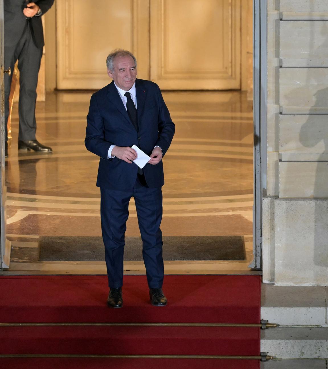 Newly-appointed Prime Minister Francois Bayrou looks on at the end of the handover ceremony at the Hotel Matignon in Paris, France, 13 December 2024. French President Macron named Francois Bayrou as the country's new prime minister on 13 December 2024. The appointment follows premier Michel Barnier's resignation after a no-confidence vote in the National Assembly on 04 December 2024