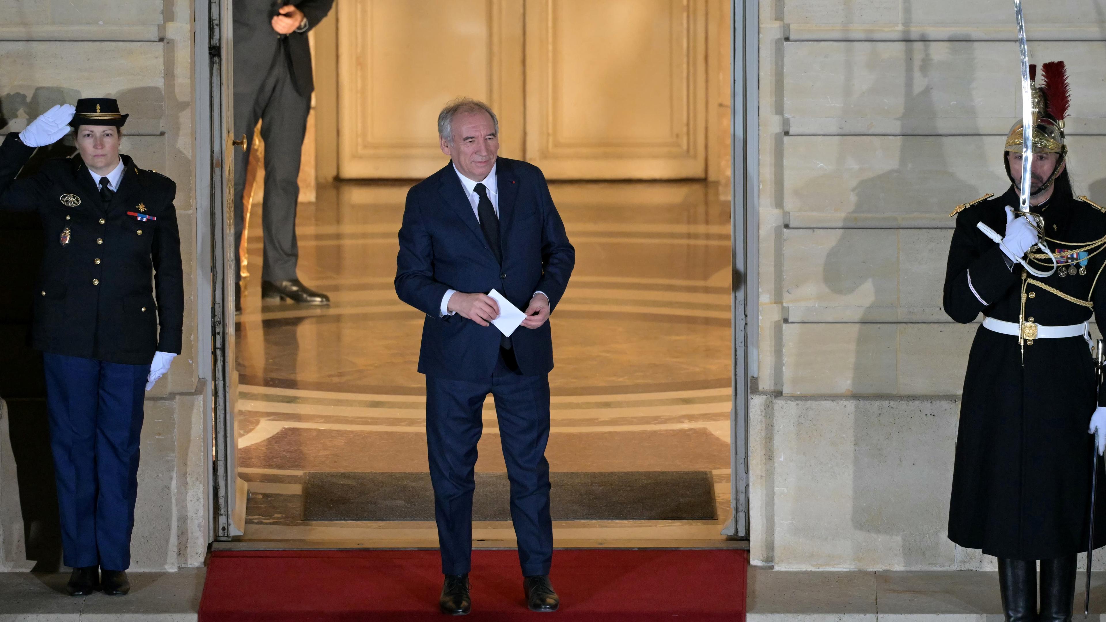 Newly-appointed Prime Minister Francois Bayrou looks on at the end of the handover ceremony at the Hotel Matignon in Paris, France, 13 December 2024. French President Macron named Francois Bayrou as the country's new prime minister on 13 December 2024. The appointment follows premier Michel Barnier's resignation after a no-confidence vote in the National Assembly on 04 December 2024