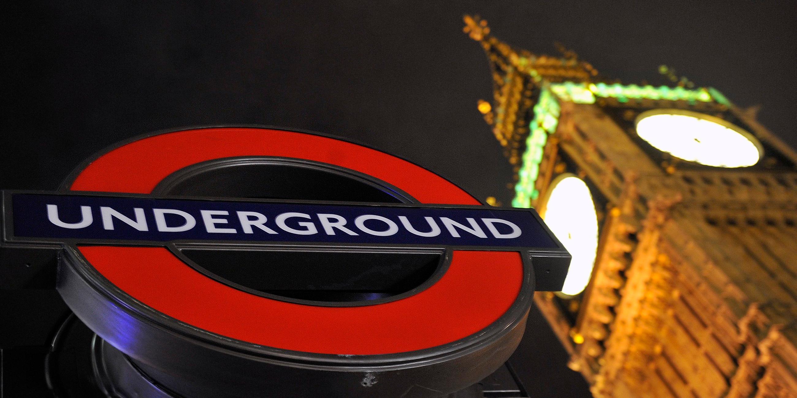 londoner u-bahn-schild vor big ben