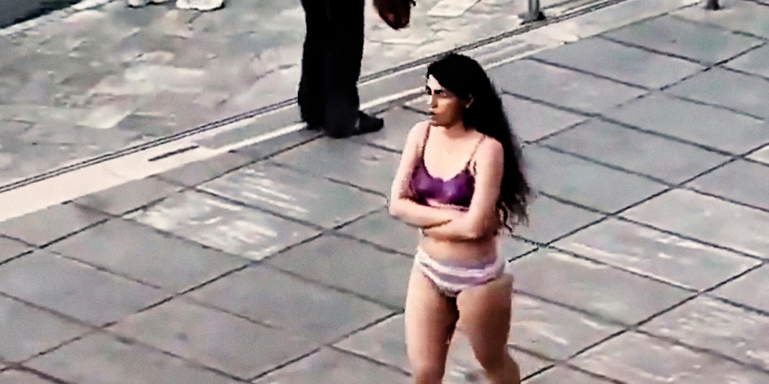 Iranian Woman Detained After Taking Clothes Off At University - Tehran