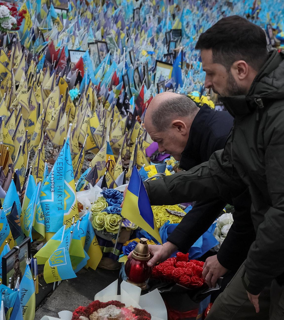 Ukraine's President Zelenskiy and German Chancellor Scholz visit makeshift memorial in Kyiv