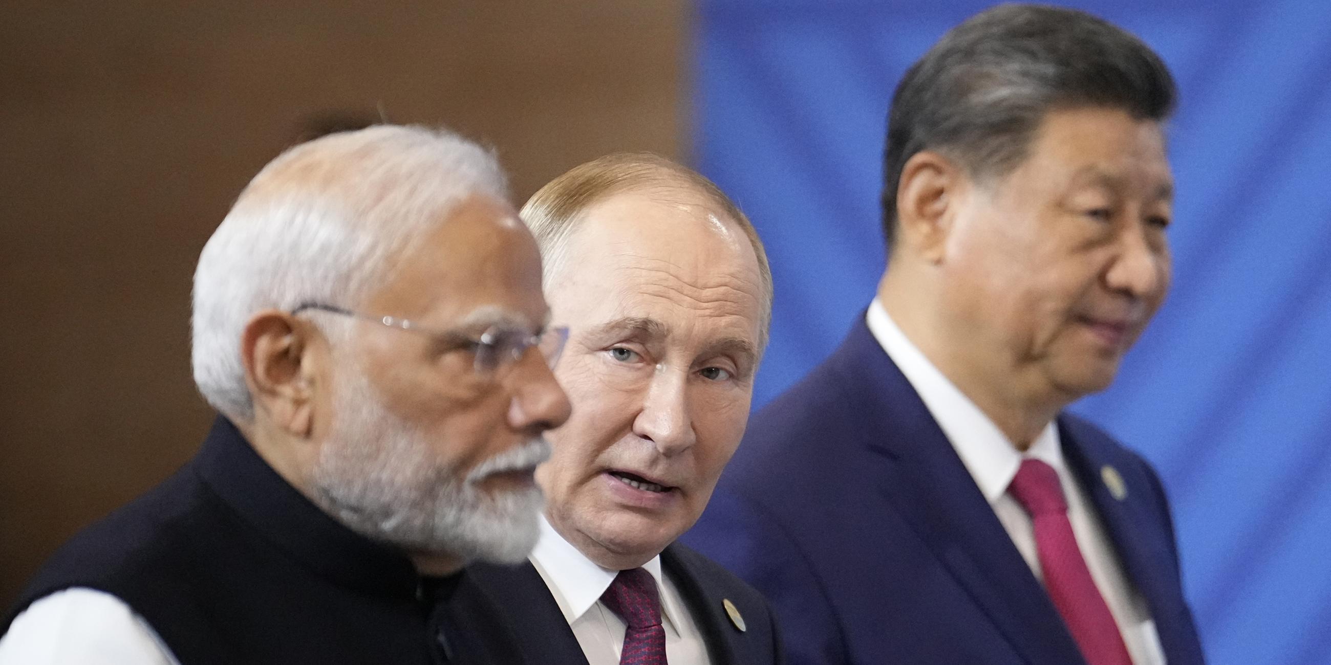 Narendra Modi, Wladimir Putin und  Xi Jinping