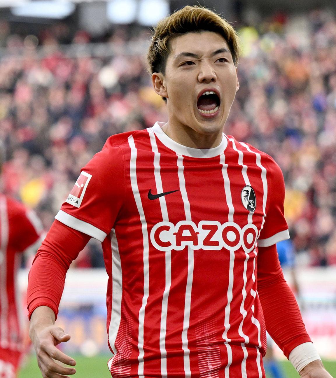 12.03.2023, Freiburg: Ritsu Doan (SC Freiburg) jubelt nach seinem Teffer zum 2:1 gegen TSG Hoffenheim