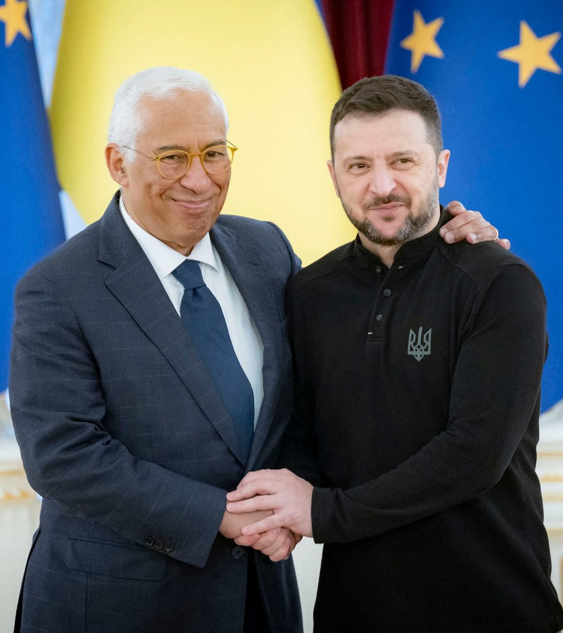 Ukrainian President Volodymyr Zelensky (R) welcoming the President of the European Council Antonio Costa during their meeting in Kyiv.