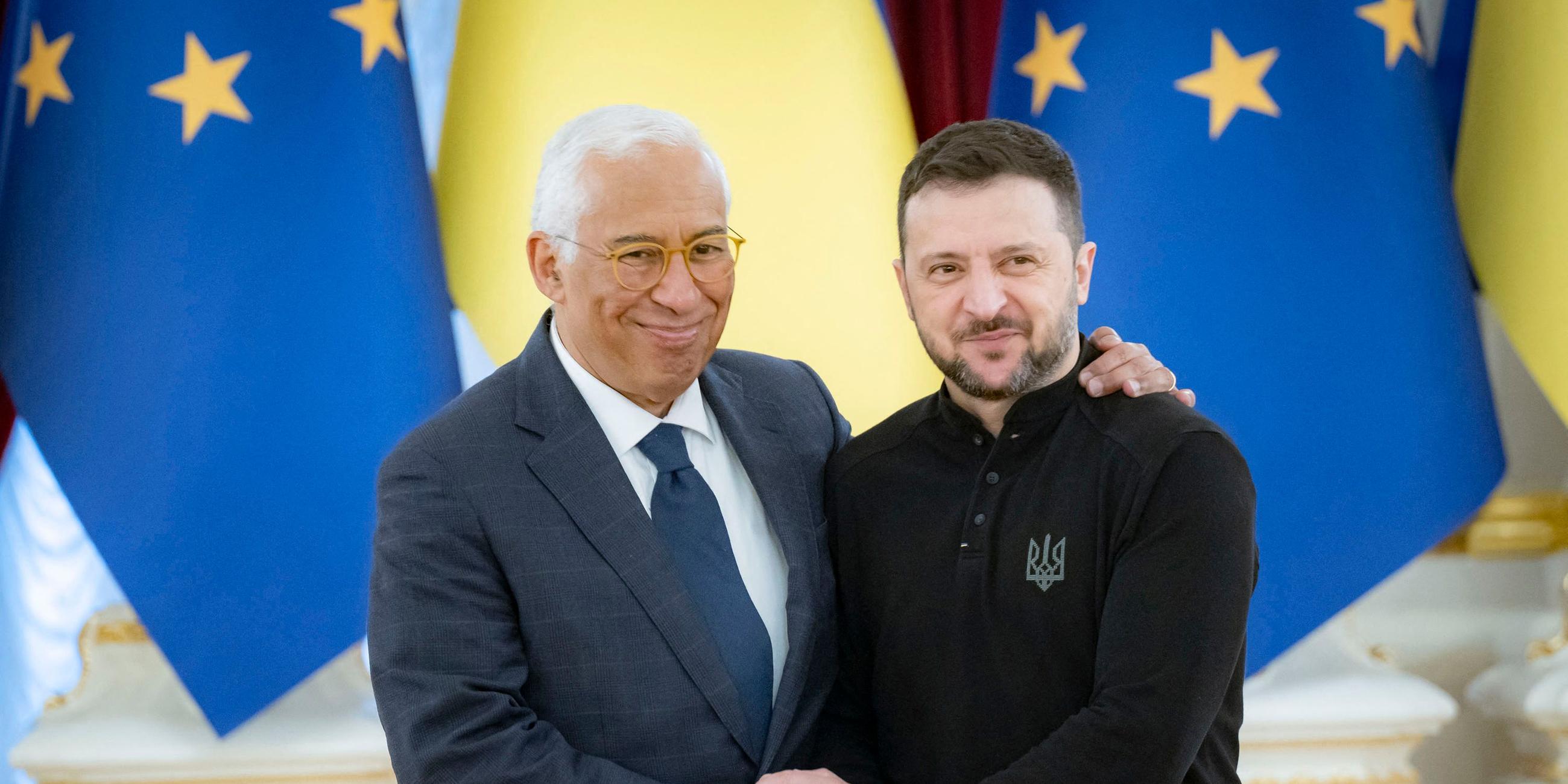 Ukrainian President Volodymyr Zelensky (R) welcoming the President of the European Council Antonio Costa during their meeting in Kyiv.