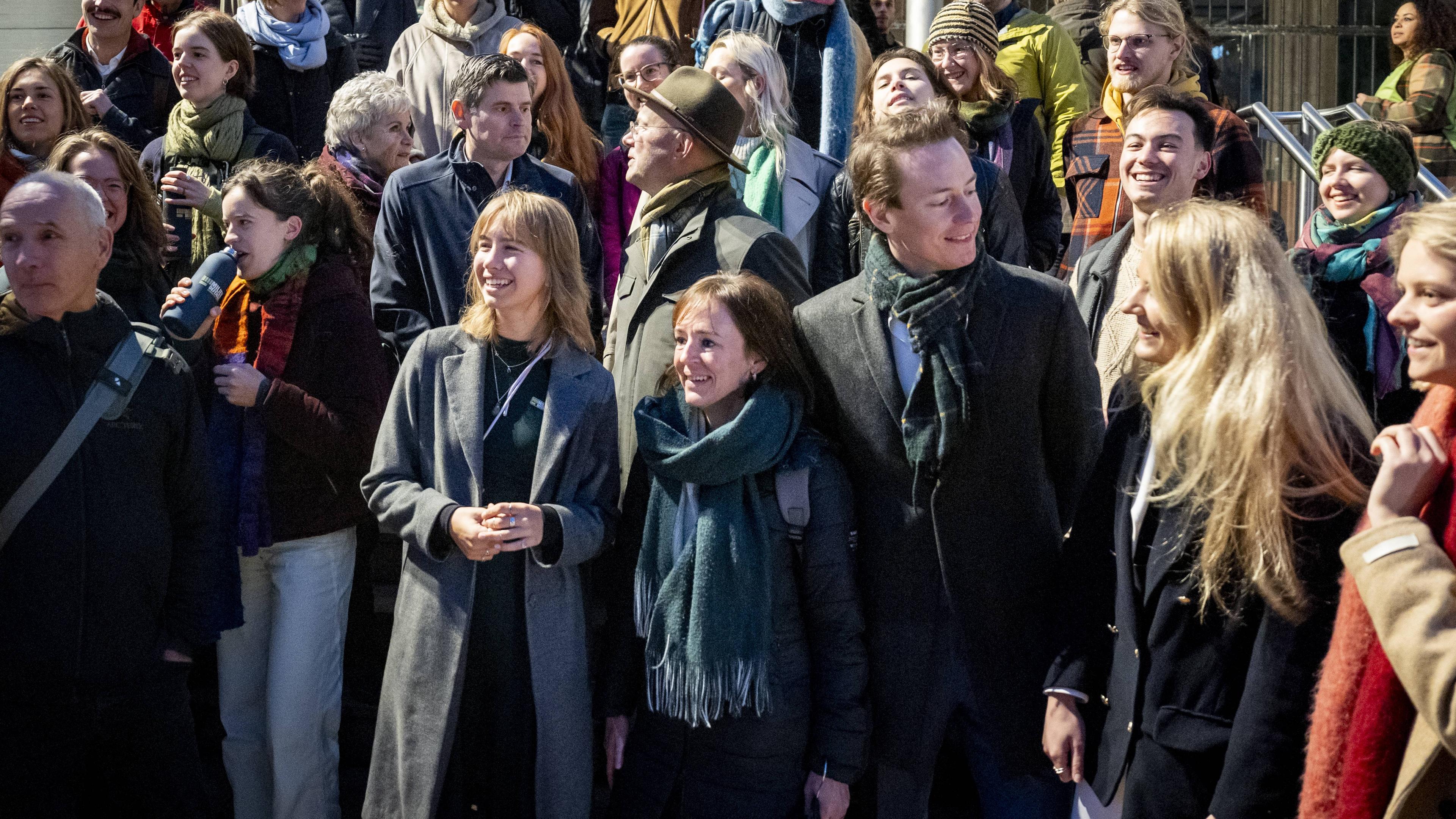 DEN HAAG - Director Donald Pols of Milieudefensie and lawyer Roger Cox amidst others at the court in The Hague prior to the ruling in the climate case between various environmental organizations and Shell.