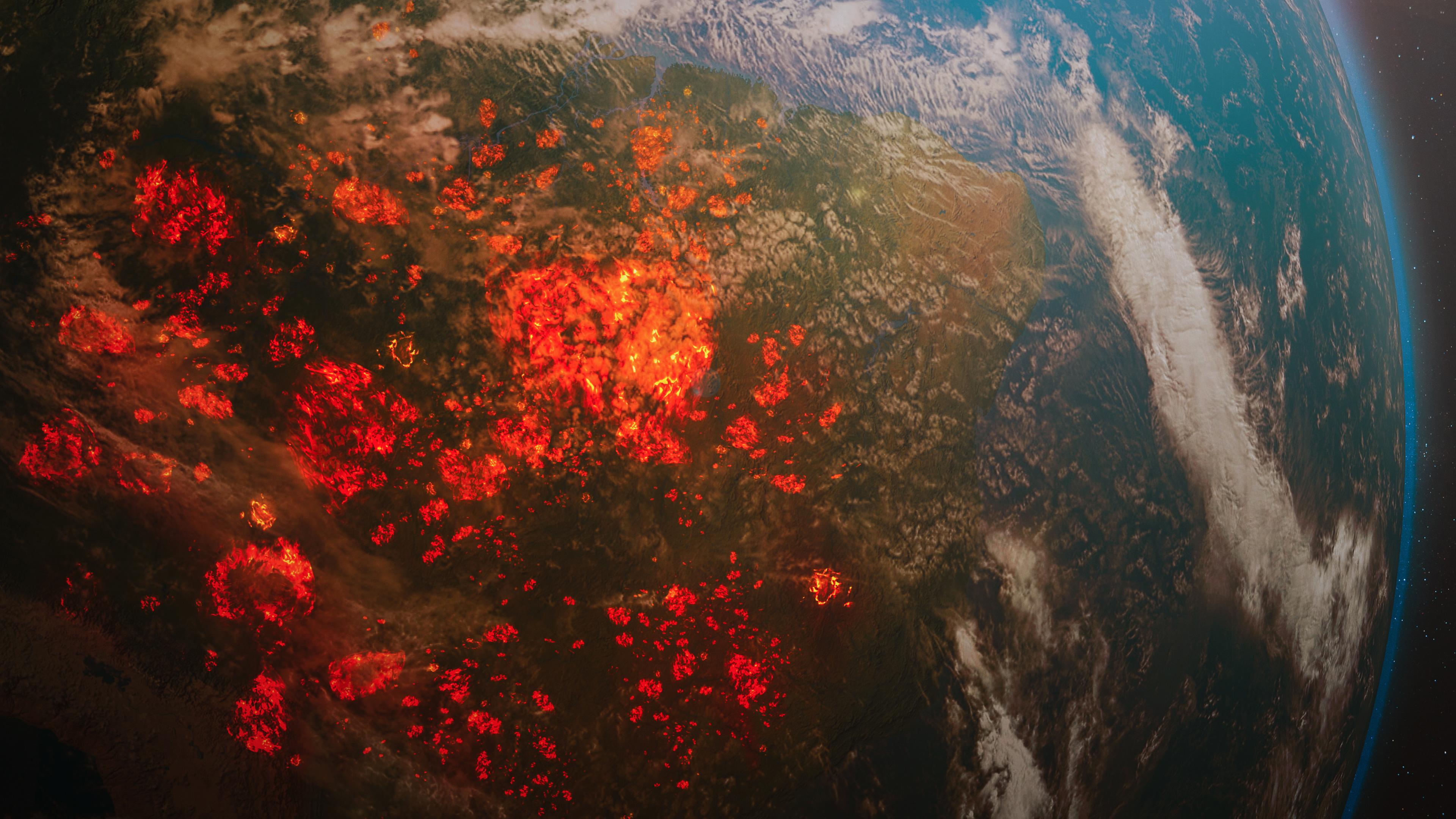 Montage: Die Erde vom Weltall aus betrachtet. Man sieht unzählige Brände überall.