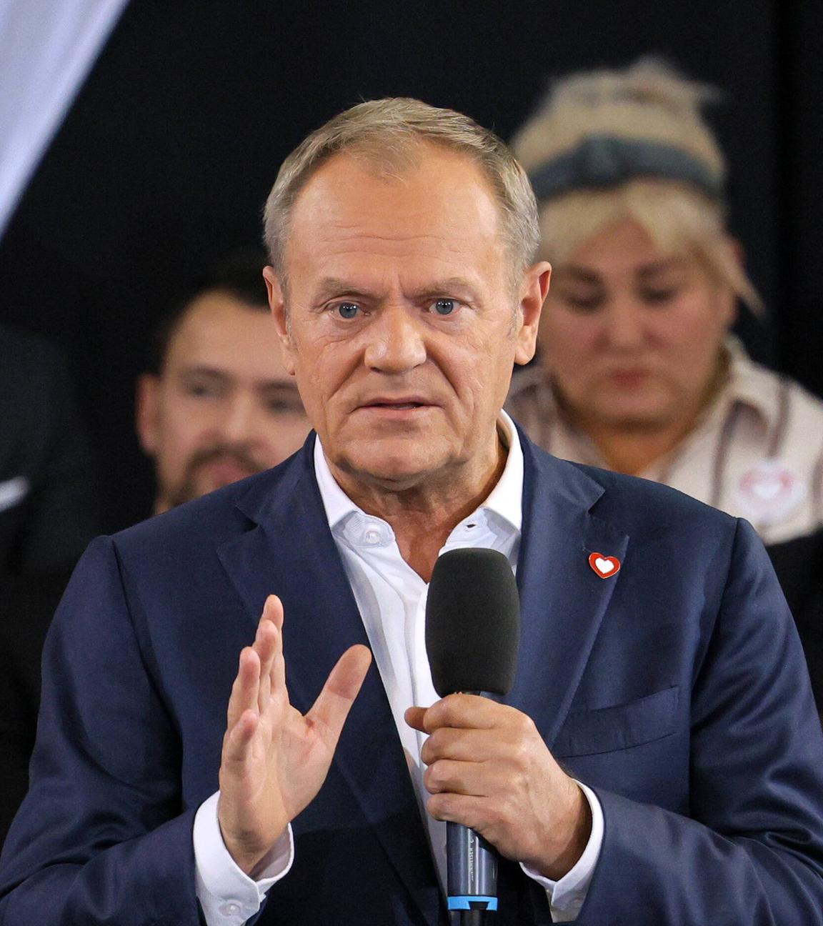 Polish Prime Minister Donald Tusk (C) speaks during the Civic Coalition convention at the OSIR Sports Hall in Warsaw, Poland, 12 October 2024.