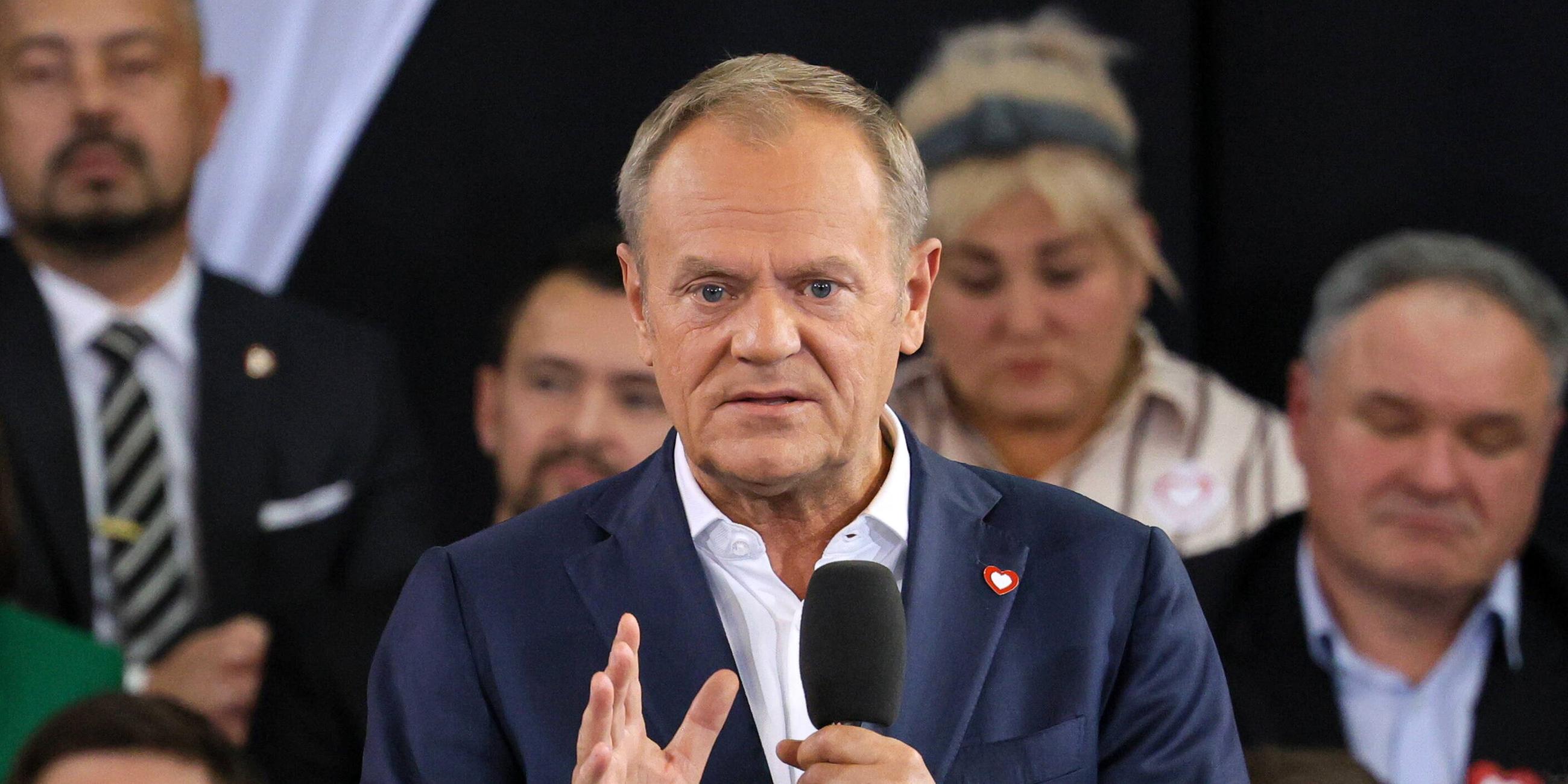 Polish Prime Minister Donald Tusk (C) speaks during the Civic Coalition convention at the OSIR Sports Hall in Warsaw, Poland, 12 October 2024.