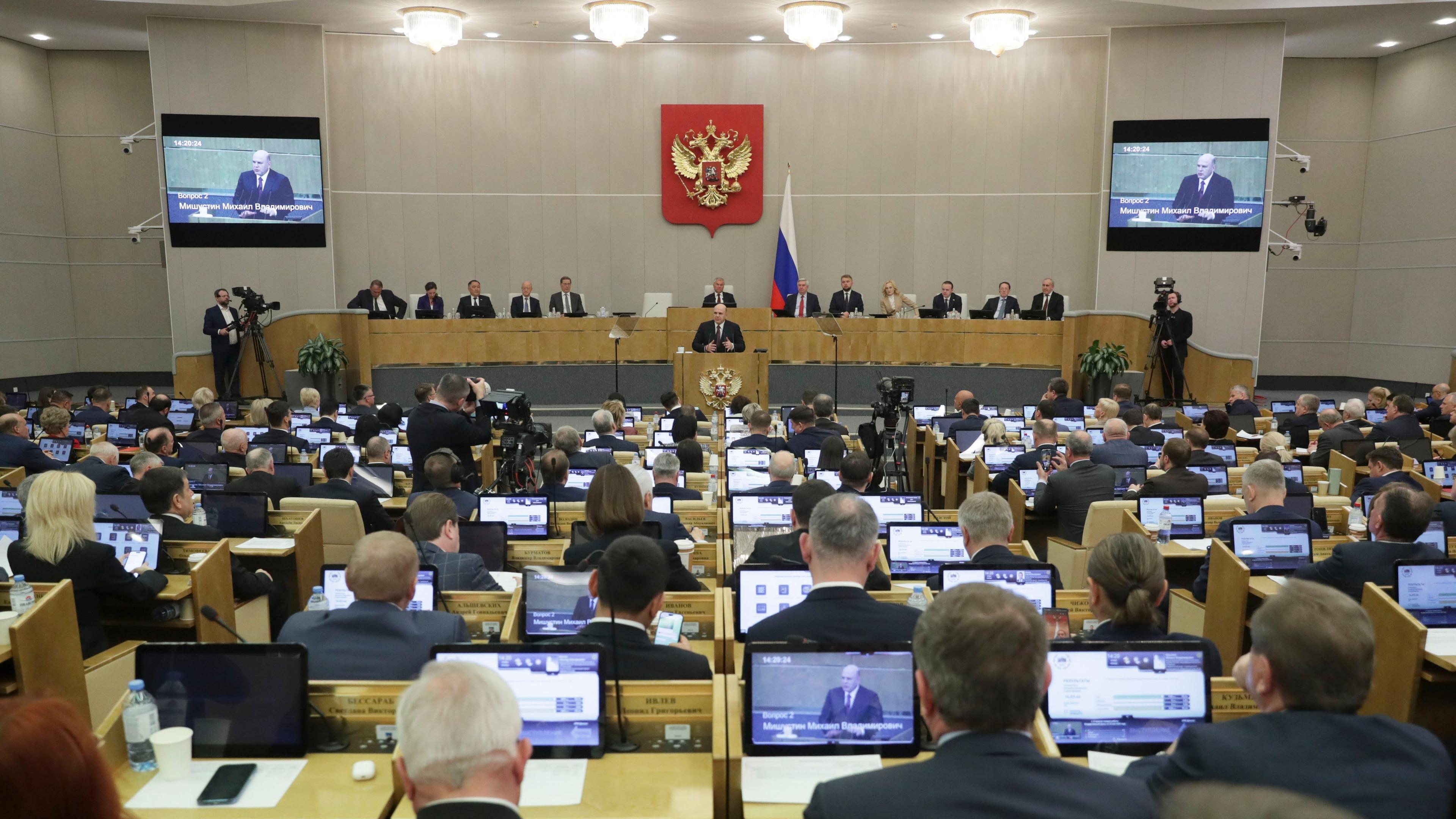 In this photo released by The State Duma, Lower House of the Russian Parliament Press Service, Russian acting Prime Minister Mikhail Mishustin, addresses the State Duma, Lower House of the Russian Parliament in Moscow, Russia, Friday, May 10, 2024. 