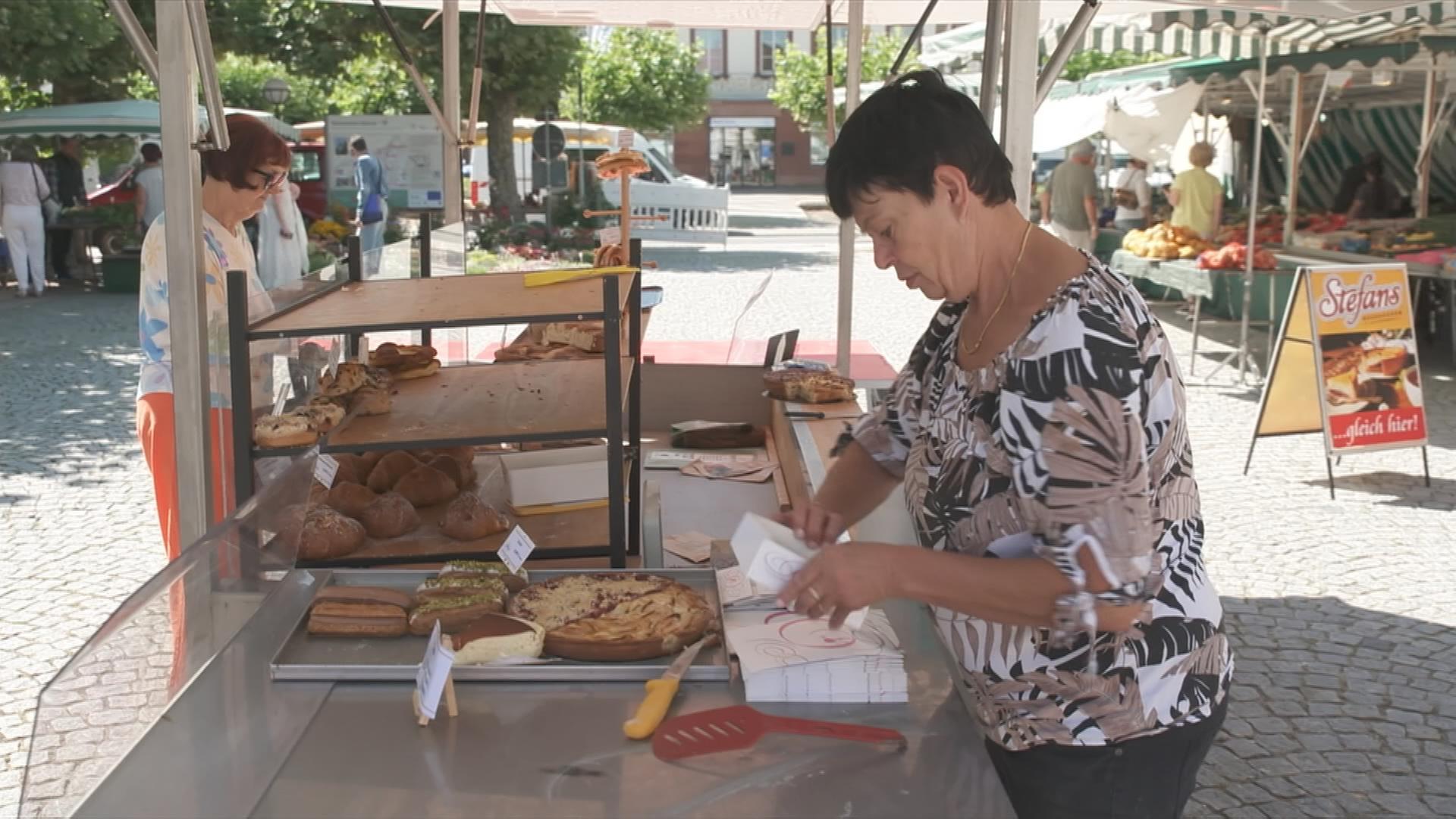 Flammkuchenverkäuferin