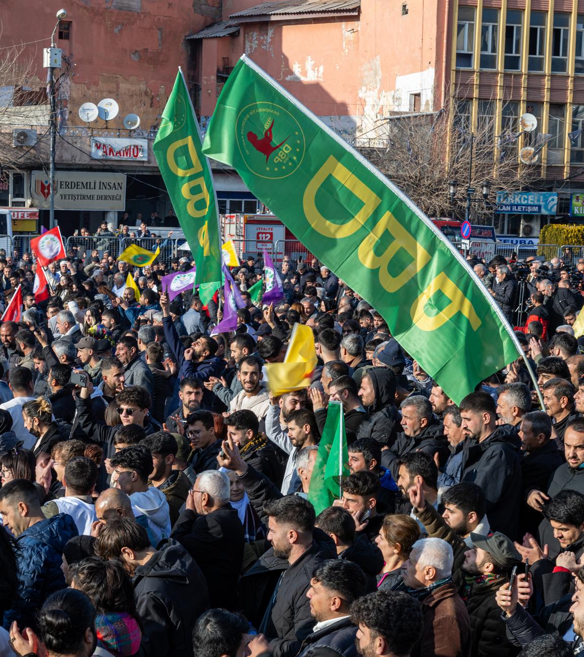 Supporters of Turkish pro-Kurdish Peoples' Equality and Democracy Party (DEM) gather to watch on a screen a press conference of a DEM delegation following their visit to jailed Kurdistan Workers' Party (PKK) leader Abdullah Ocalan, in Diyarbakir, Turkey, 27 February 2025. 