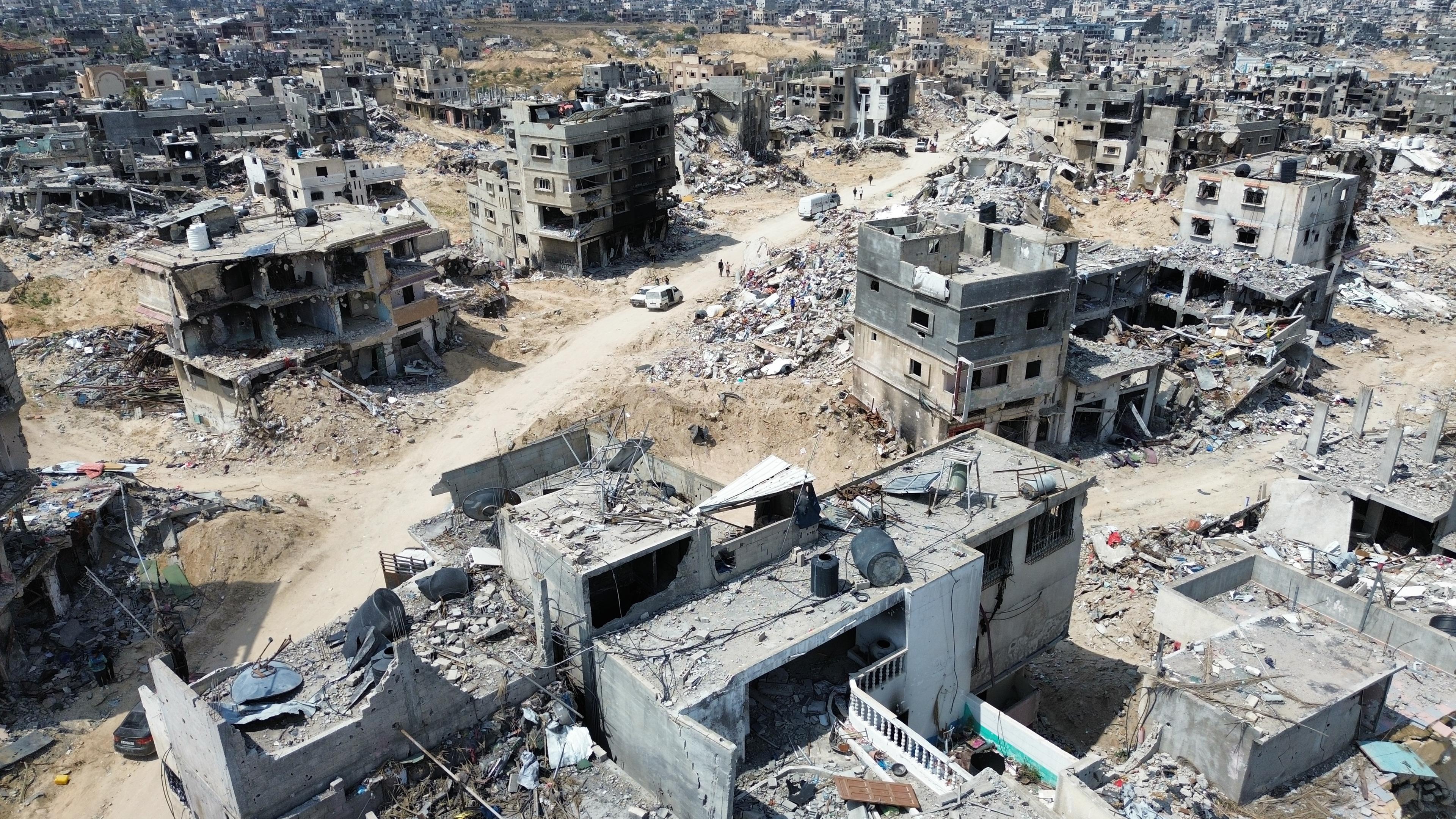 Aerial view taken with a drone showing general destruction in the city of Khan Yunis in the Gaza Strip, following the Israeli army withdrawal from the region, on 14 April 2024. 