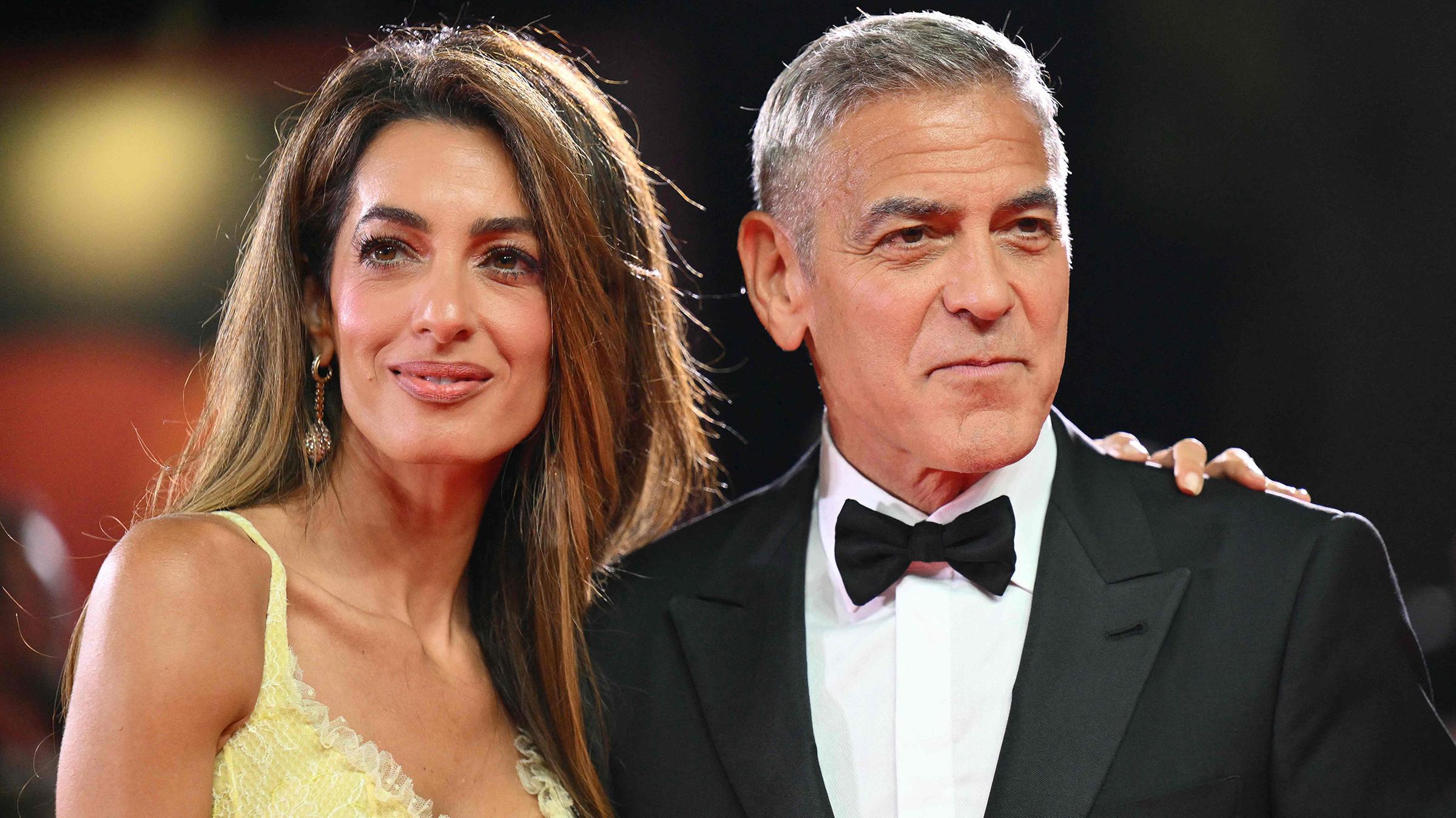 George Clooney und seine Frau Amal zusammen auf dem roten Teppich in Venedig. 