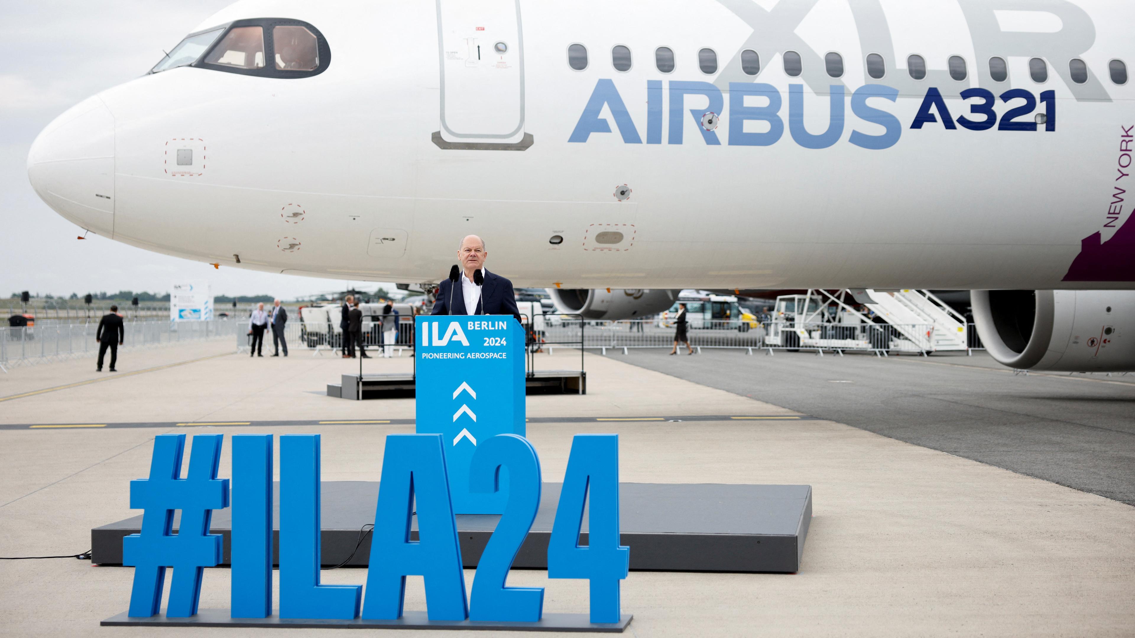 German Chancellor Olaf Scholz speaks on the opening day of the International Aerospace Exhibition ILA at Schoenefeld Airport, in Berlin, Germany June 5, 2024.