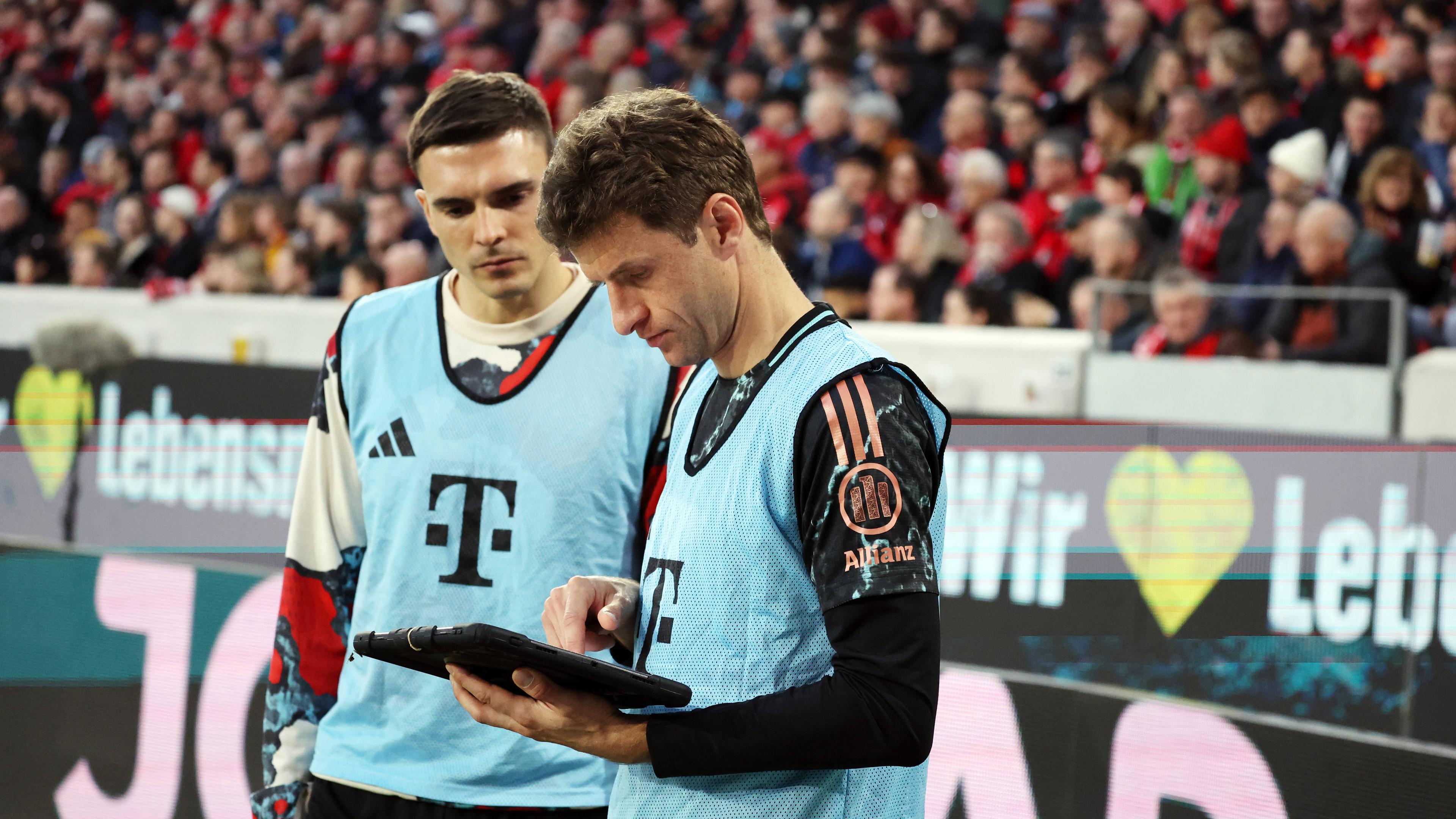 Joao Palhinha und Thomas Müller