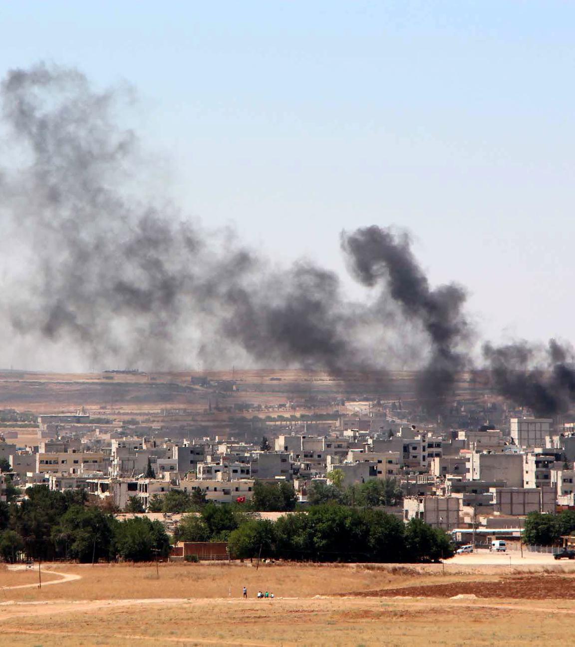 Rauch über Kobane an der Grenze von Türkei und Syrien.