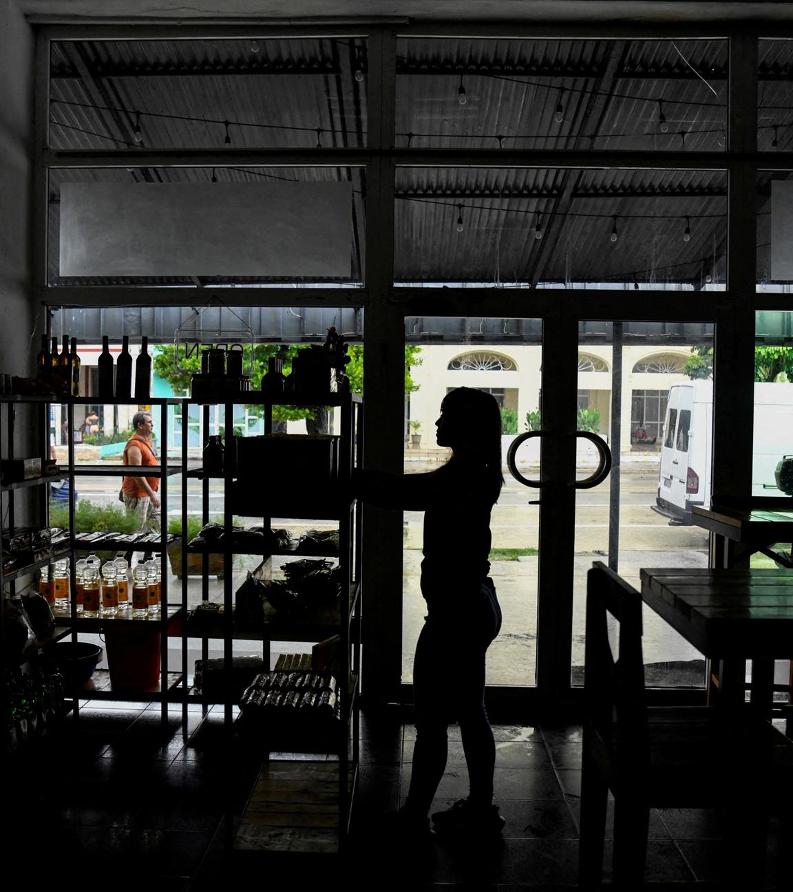  A woman works in a restaurant during a blackout in Havana, Cuba,