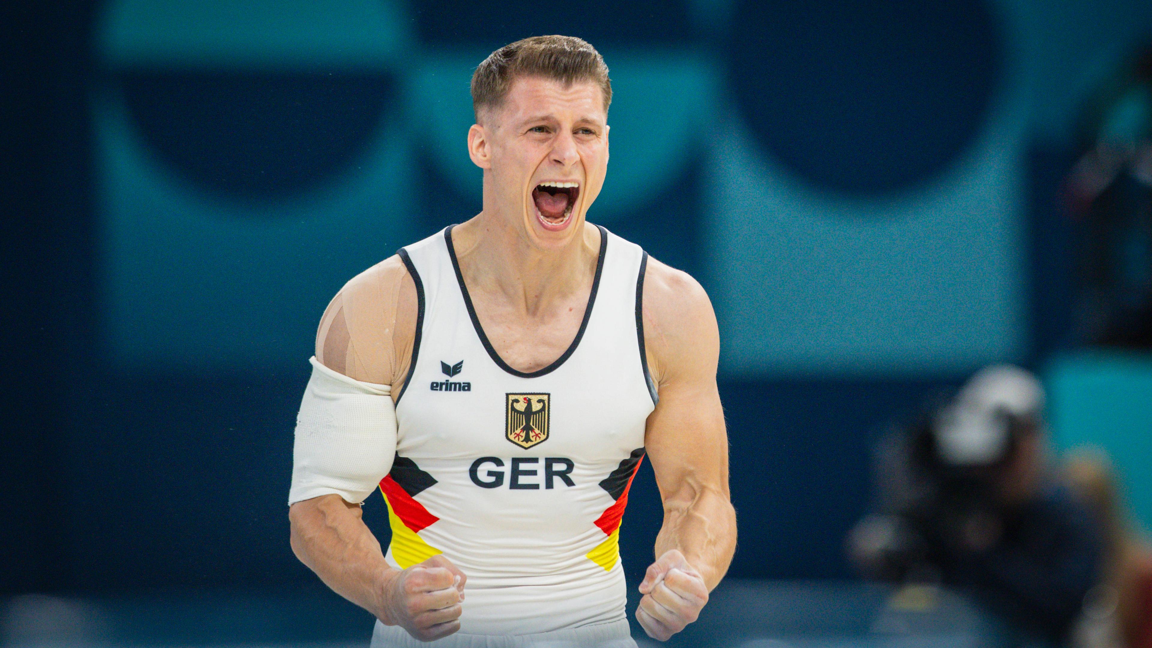 Deutschlands Turner Lukas Dauser jubelt.