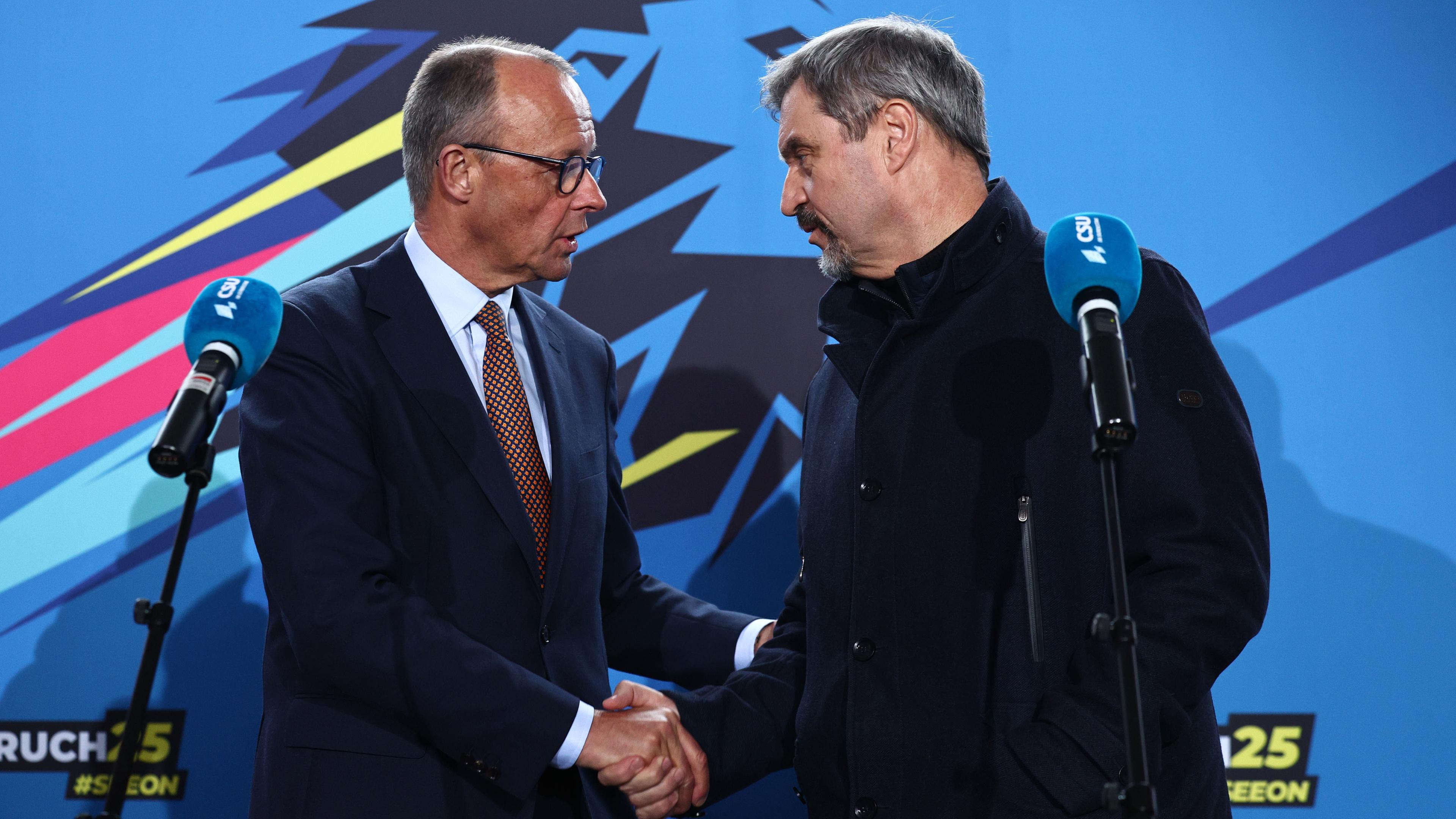 Chairman of Germany's Christian Democratic Union (CDU) Friedrich Merz (L) and State Premier of Bavaria and Christian Social Union (CSU) chairman Markus Soeder (R) attend a press conference at the CSU closed-door meeting at the Seeon Monastery in Seeon-Seebruck, Germany, 08 January 2025.