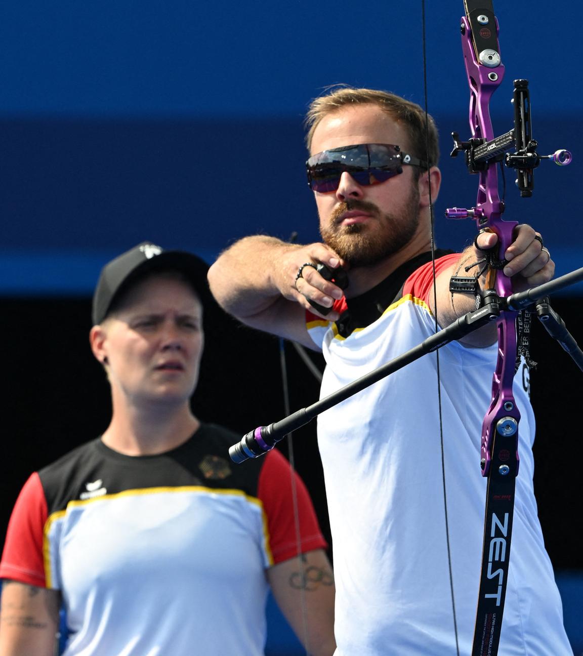 Deutschlands Michelle Kroppen und Florian Unruh beim mixed Team Wettkampf.