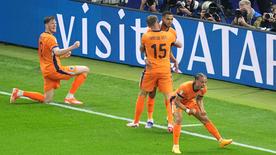 UEFA EURO 2024, kwartfinales Nederland-Turkije in Berlijn: de Nederlandse spelers Wout Weghorst, Micky van de Ven, Cody Jacobo en Xavi Simons (vanaf links) vieren feest na het doelpunt dat de stand op 2-1 bracht.