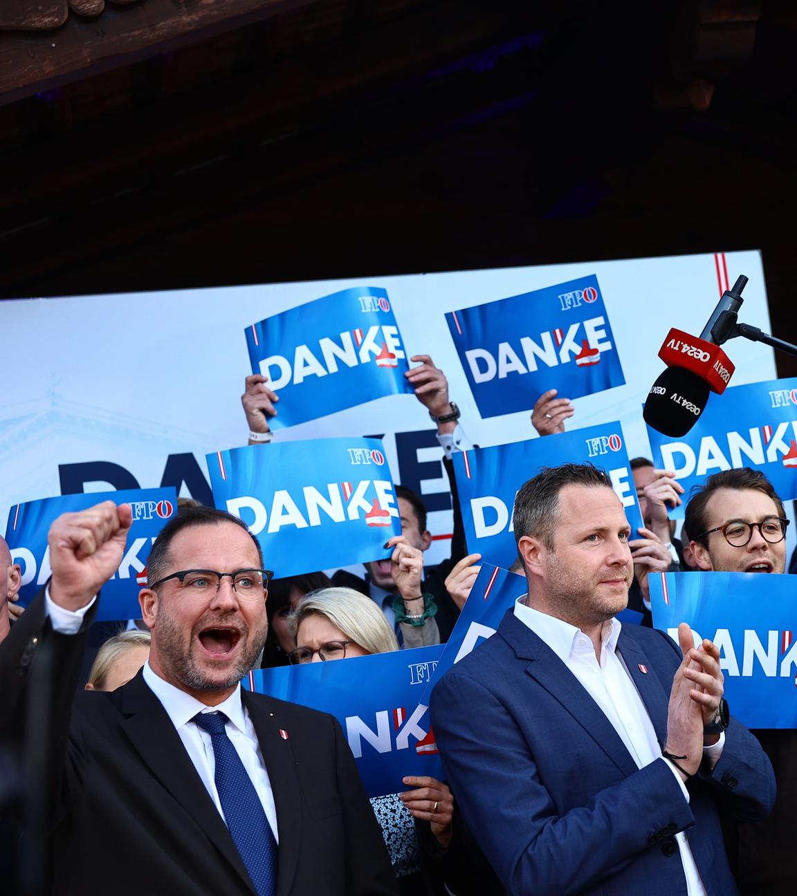  Members of the Freedom Party of Austria (FPOe) celebrate early voting results during parliamentary elections in Vienna