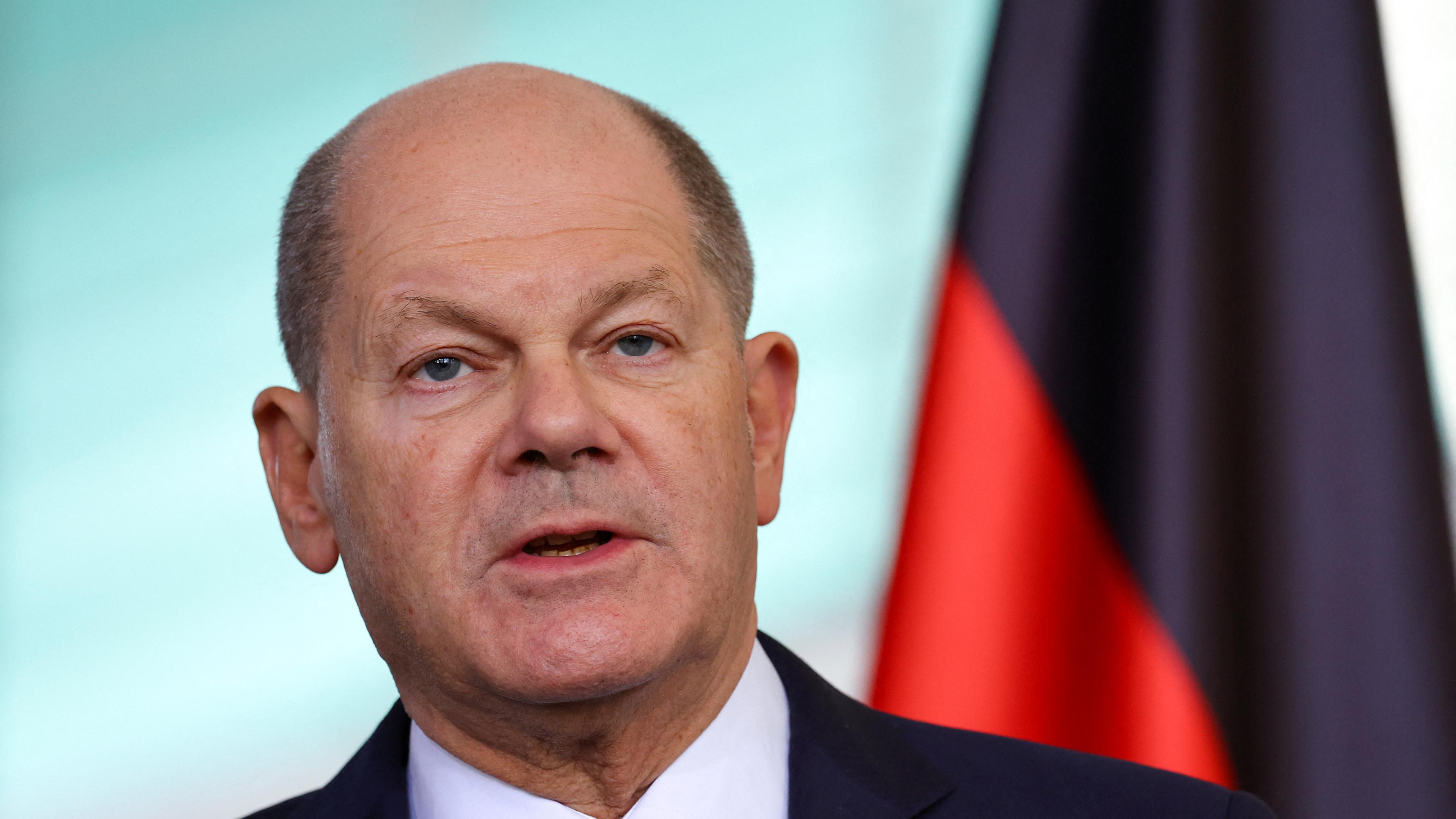 German Chancellor Olaf Scholz attends a press conference 