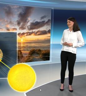 Die Wetter-Moderatorin Christa Orben erklärt die Tagundnachgleiche und die Jahreszeiten mit einem grafischen Globusmodell