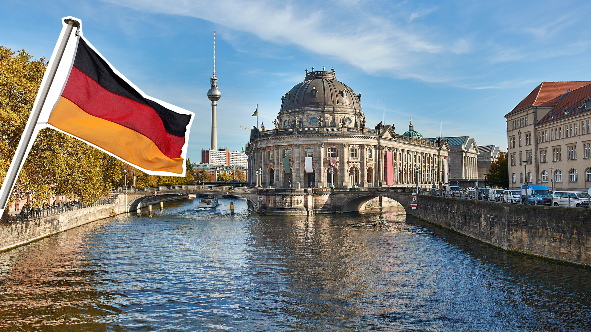 Bild aus Berlin mit der Spree und der Deutschen Flagge