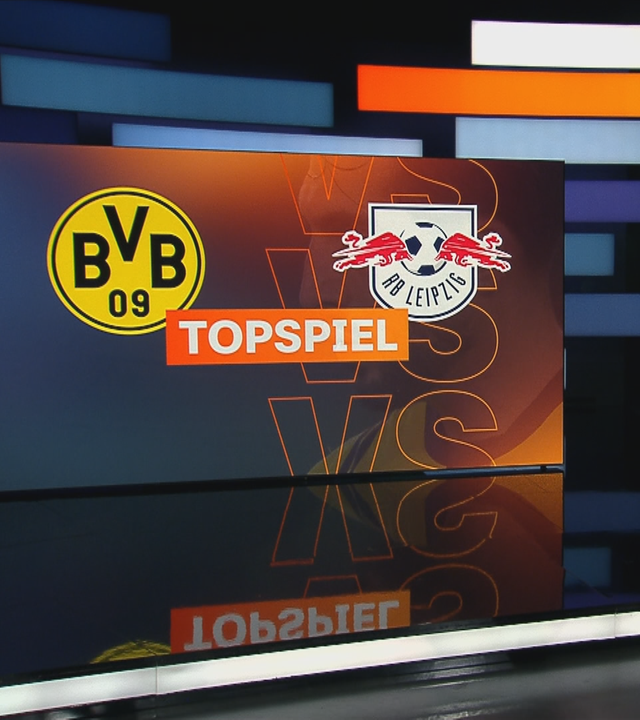 Katrin Müller-Hohenstein mit Topspiel-Logo.