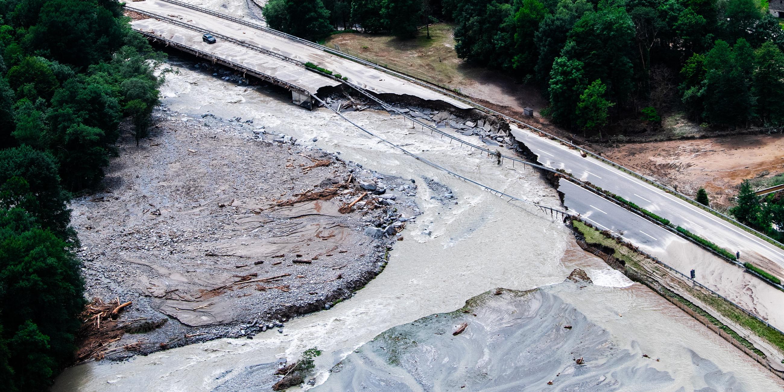 A picture taken with a drone of A13 highway between Lostallo and Soazza destroyed by the force of the Moesa river, caused by the bad weather and heavy rain in the Misox valley, in Lostallo, southern Switzerland, 22 June 2024. Massive thunderstorms and rainfall had led to flooding after a landslide in the Misox valley. Several dozen people had to be evacuated from their homes in the Misox and Calanca regions.